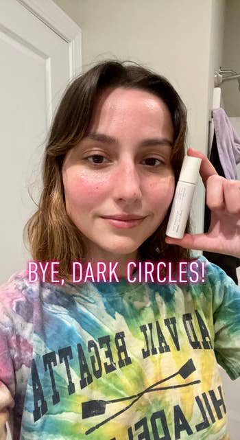 BuzzFeed editor Genevieve Scarano wearing Korres eye gel on her face