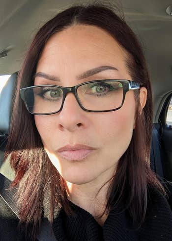 reviewer wearing the primer nether  makeup, giving them a brushed  look
