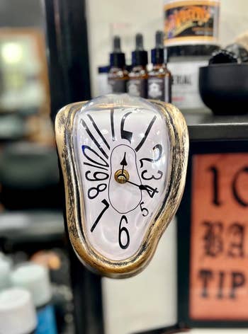 Surreal melting timepiece resembling Salvador Dali's art.