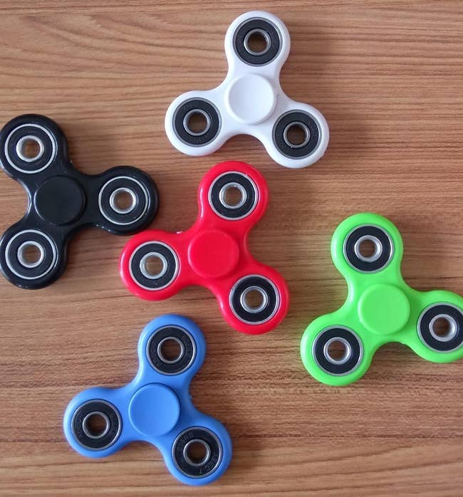 Reviewer image of five fidget spinners
