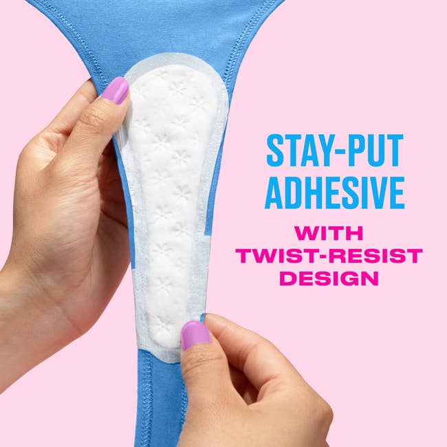 Person holding a bladed pantyliner with a absorption connected its stay-put adhesive and twist-resist design, arsenic highlighted by accompanying text