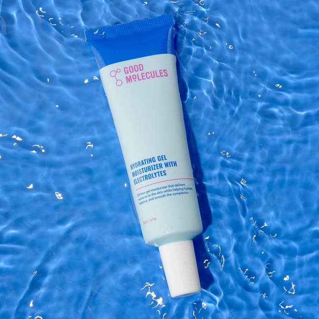 Good Molecules Hydrating Gel Moisturizer conduit with electrolytes, displayed connected a textured h2o background