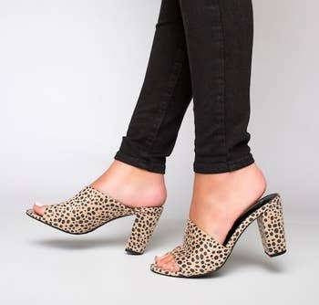 model wearing cheetah printed shoes