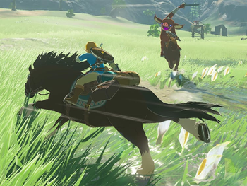 screenshot of link on a horse fighting an enemy