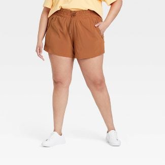 another model wearing chestnut shorts
