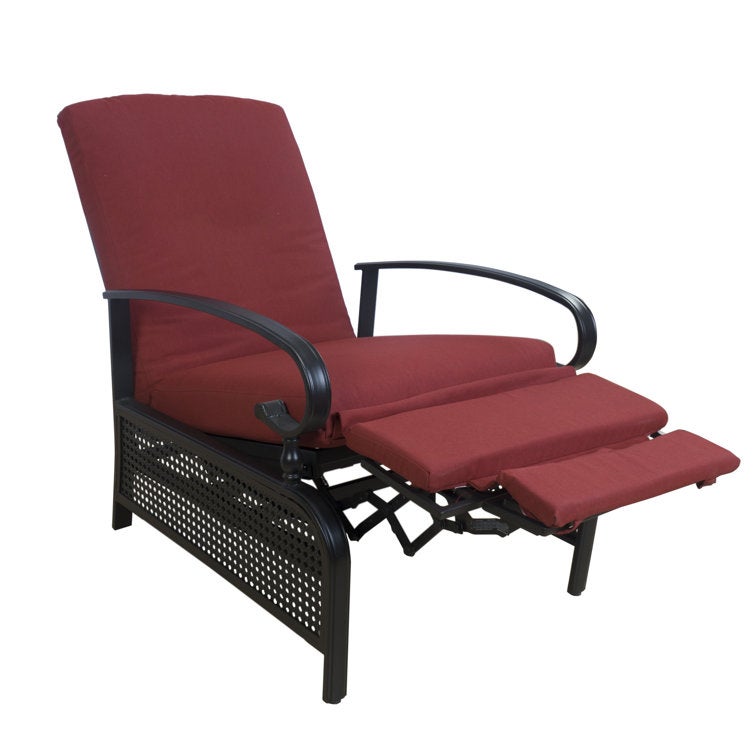 burgandy cushioned recliner with black metal frame on patio