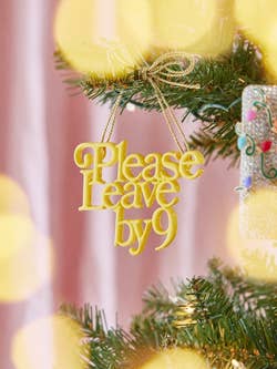 yellow text ornament that says 