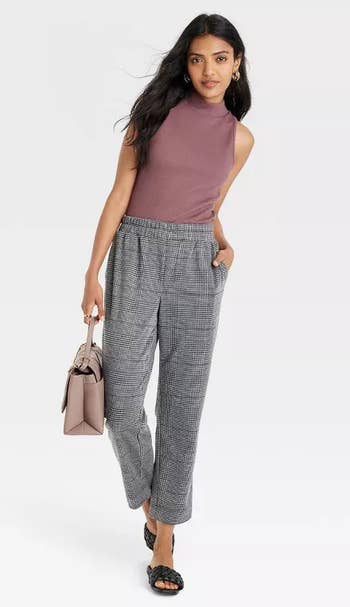 model wearing the pants in heather gray plaid