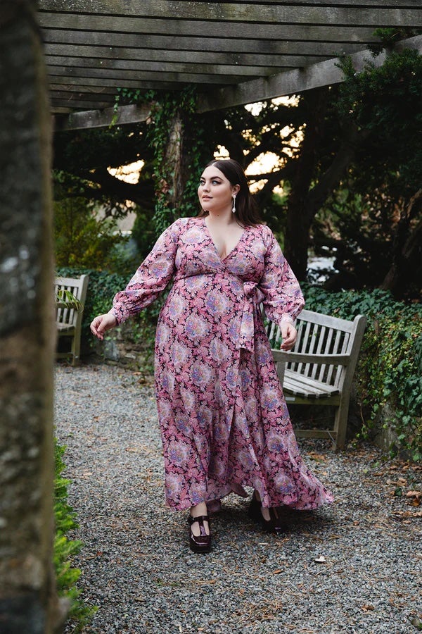 model in maxi paisley print dress