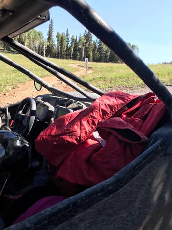reviewer photo of red picnic blanket on Jeep