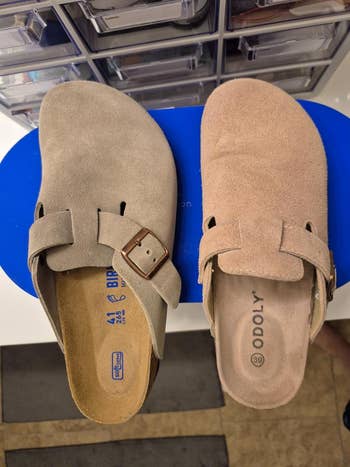 Two suede slip-on sandals displayed side by side; left is birkenstock right is the alternative