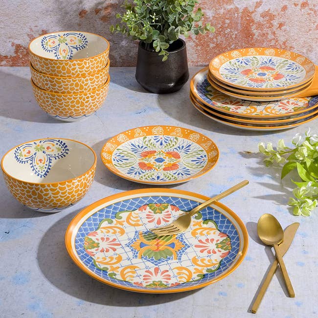 Mix-and-match colorful mosaic plates and bowls on a table