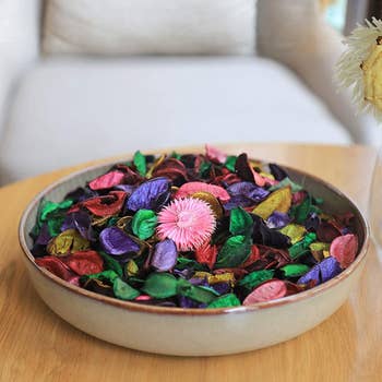 multicolored potpourri in a shallow bowl on a table