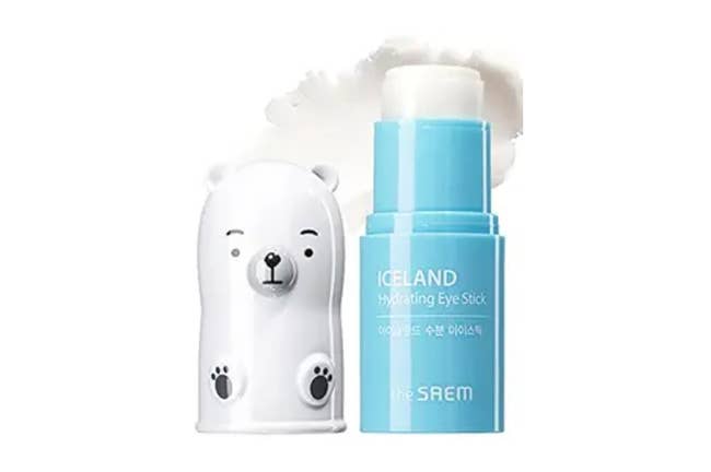 Polar bear-themed hydrating eye stick packaging beside the opened product, with visible cream texture