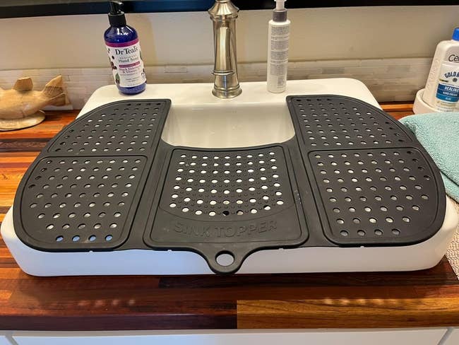 folding retired tray that fits implicit sink