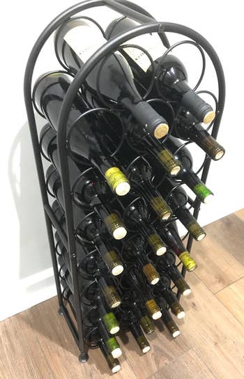 Reviewer image of black freestanding wine rack