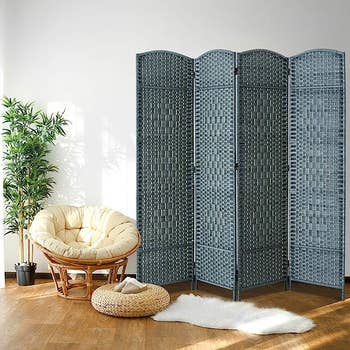 blue four-panel woven room divider