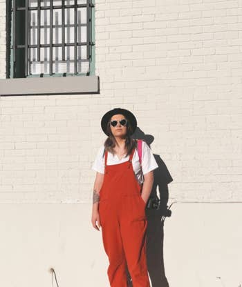 Reviewer wearing the overalls in orange