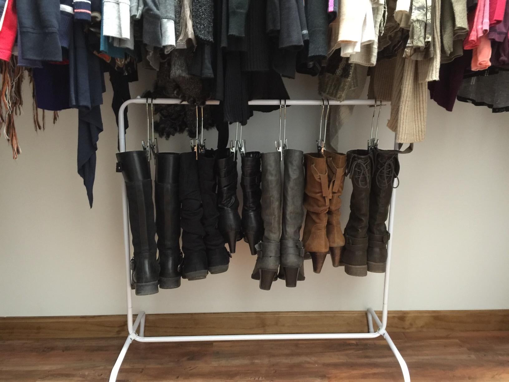 Boots hung up on organizing rack