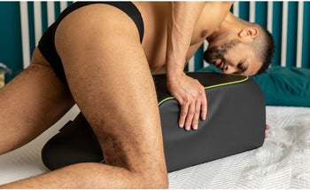 Man demonstrating use of fleshlight mount with pose