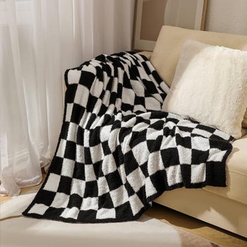 a black and white checkered throw blank