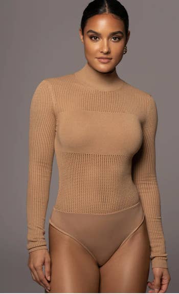 model wearing the bodysuit in tan