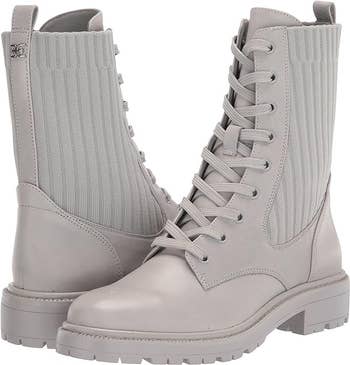 Pair of achromatic  lace-up boots with ribbed broadside  panels