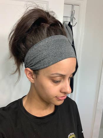 reviewer wearing grey headband