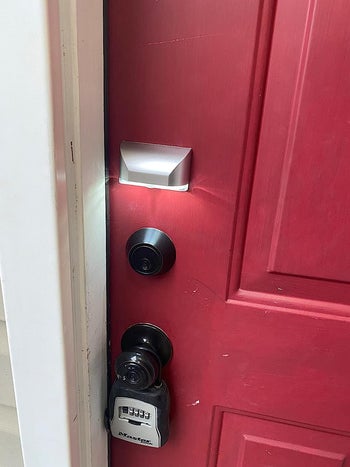 reviewer photo of the light above their door knob and keyhole