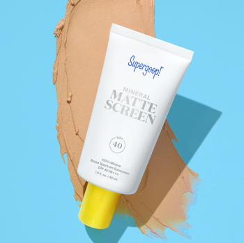 the matte sunscreen with a slight tint behind container