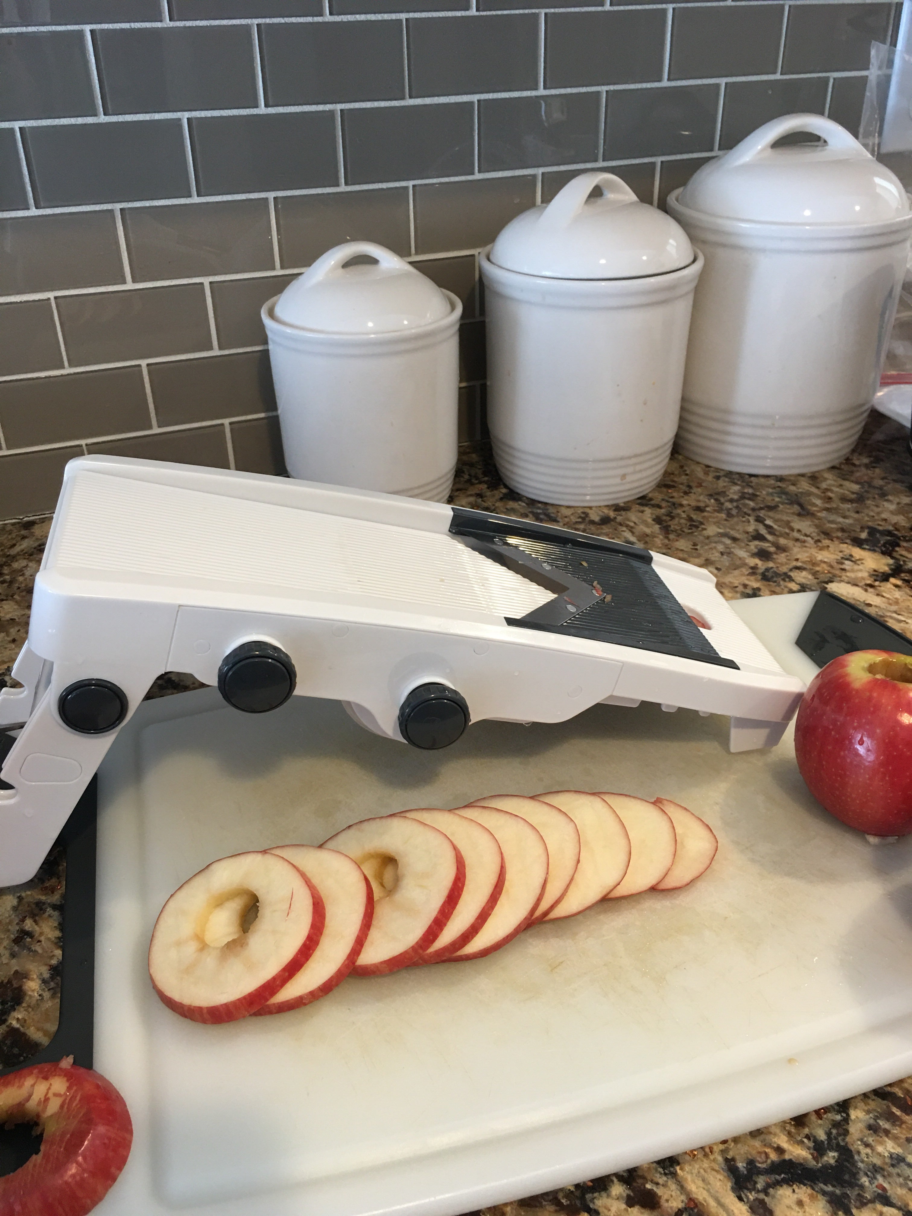 Apples thinly sliced by mandolin