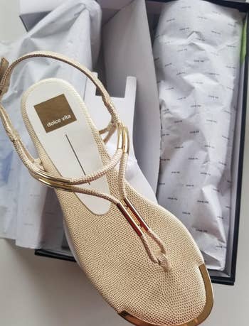a reviewer photo of the sandal in tan 
