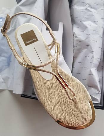 a reviewer photo of the sandal in tan 
