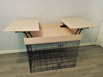 the dog crate topper with the lid open showing a shallow storage space
