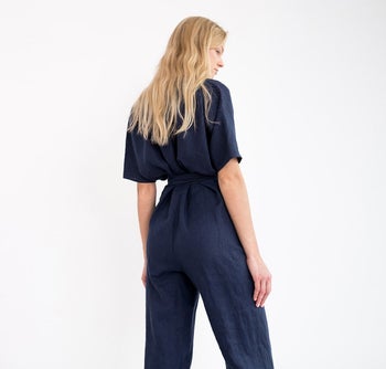 back of model wearing the navy jumpsuit