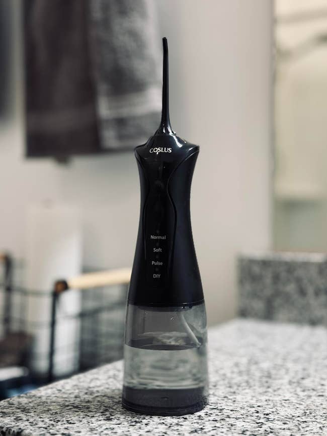 Electric h2o flosser connected bath counter, featuring aggregate modes for personalized dental care