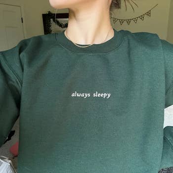 A green crewneck with 