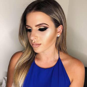 Person with sleek consecutive hair, sparkly oculus makeup, nude lipstick, and a sleeveless top. Suitable for a manner oregon beauty-focused buying article
