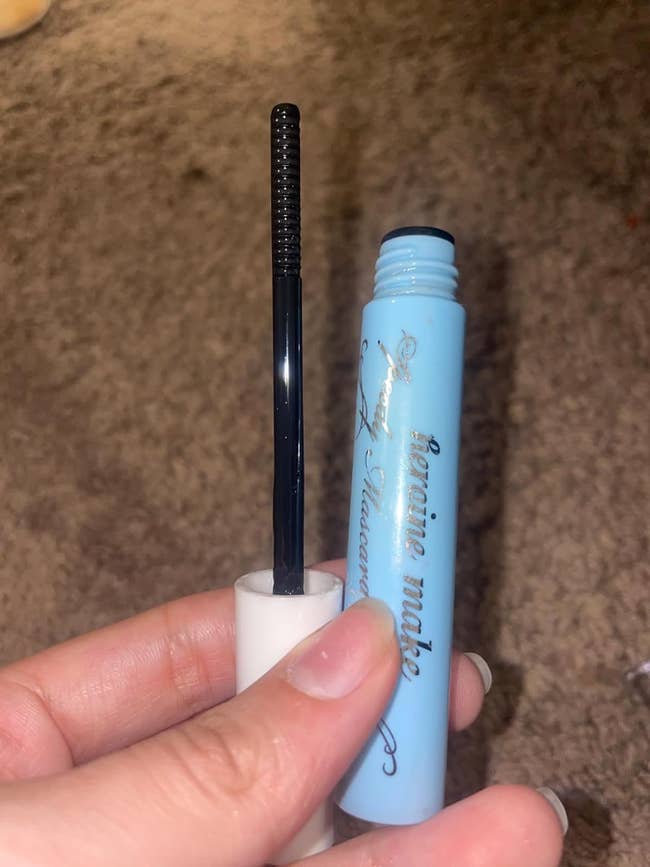 reviewer photo of the mascara remover, which looks like a tube of mascara and has a wand similar to a mascara wand
