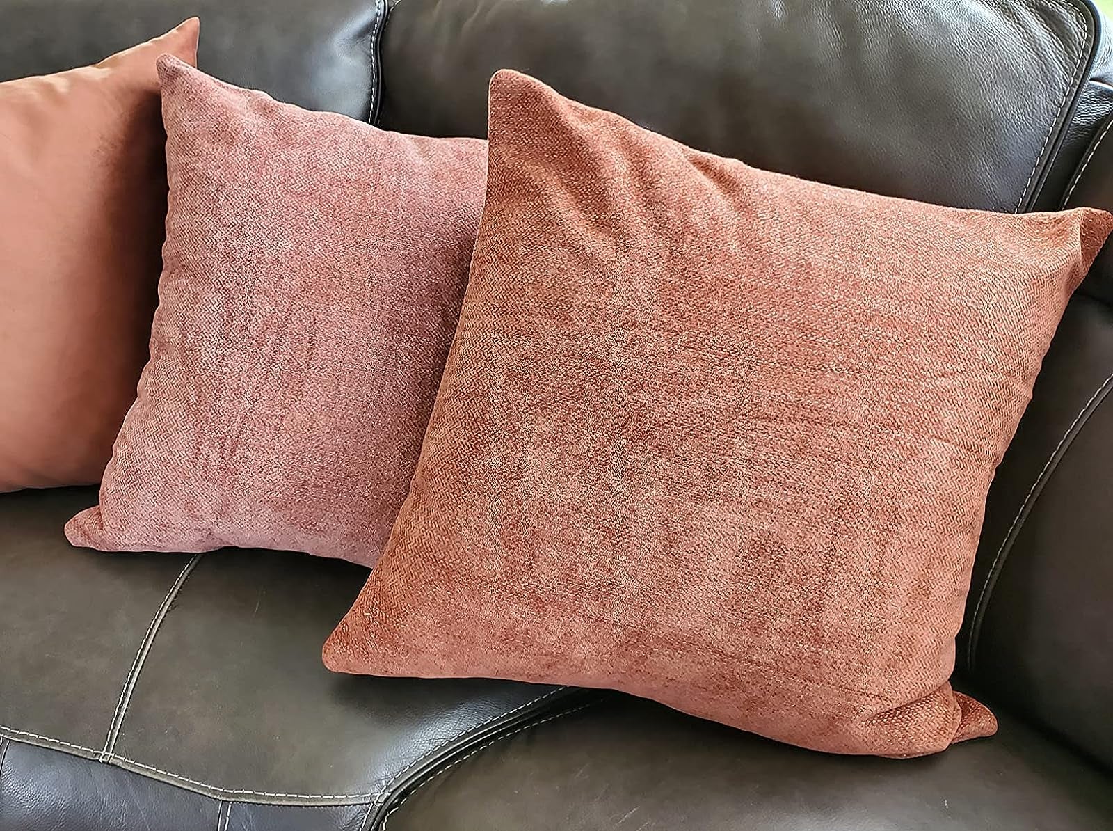 a reviewer's set of orange pillows
