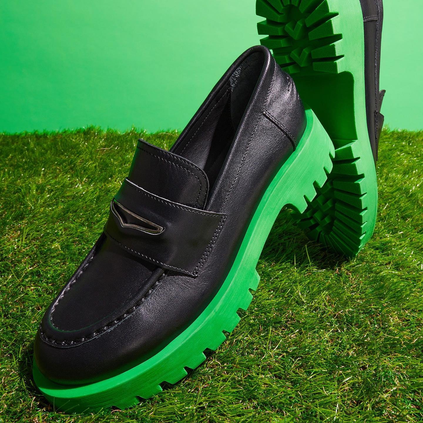 black loafers with green soles and small one inch heel