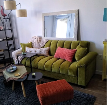 reviewer photo of the couch in green