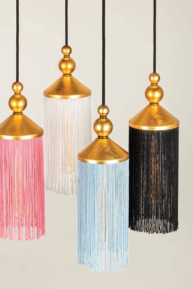 Hanging tassel lamps with brass tops in various fringe lengths