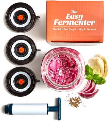 the easy fermenter kit including the three lids and pump