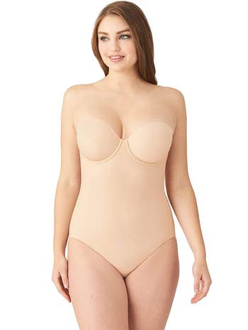 model wearing the strapless bodysuit in a beige color