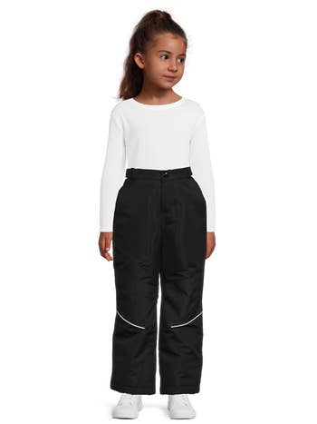 a young model wearing the black pants
