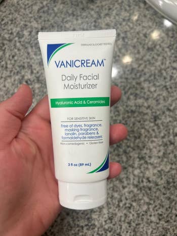 Tube of Vanicream Daily Facial Moisturizer held successful  hand, labeled for delicate  tegument  with hyaluronic acerb  and ceramides