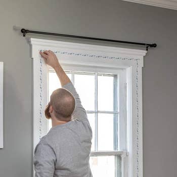 A model applying adhesive to window frame