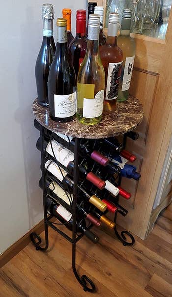 Reviewer image of the smaller wine rack with lots of wine bottles