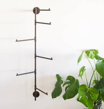 the wall-mounted rack with the spokes in a different configuration 